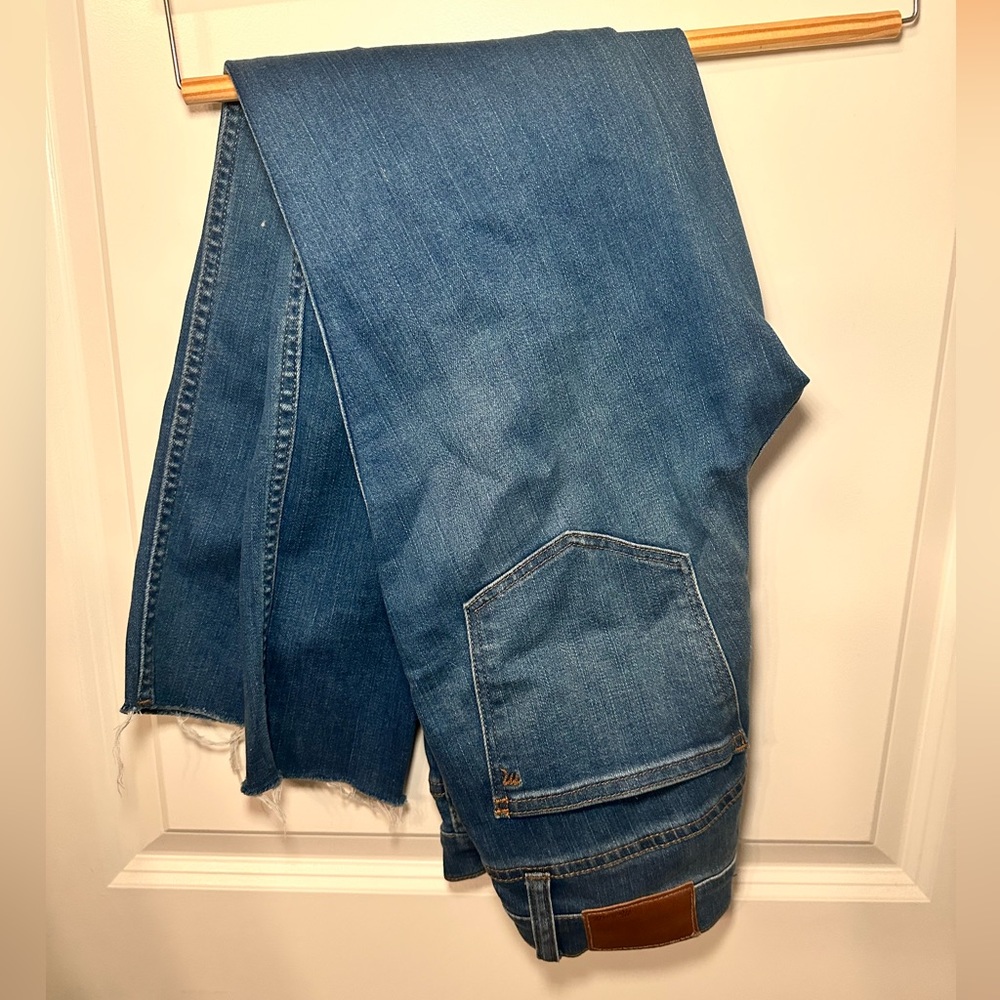 Medium wash distressed skinny jeans